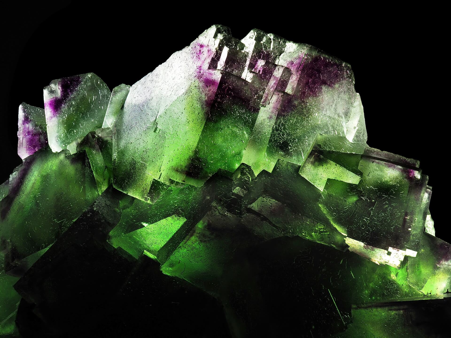 An imposing formation of purple-tipped translucent green Fluorite.