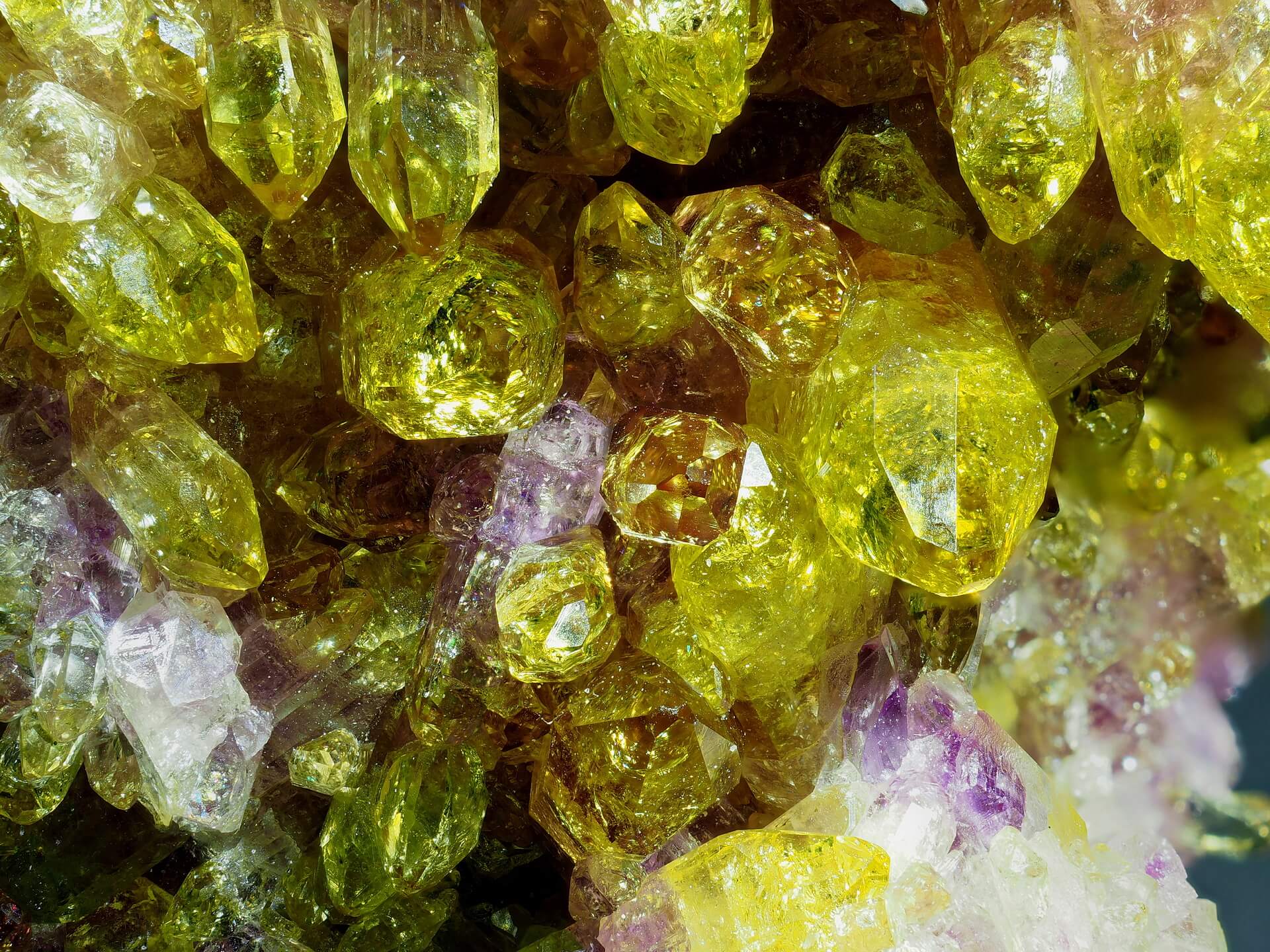 Macro shot of well-formed yellow and pink Vesuvianite crystals.