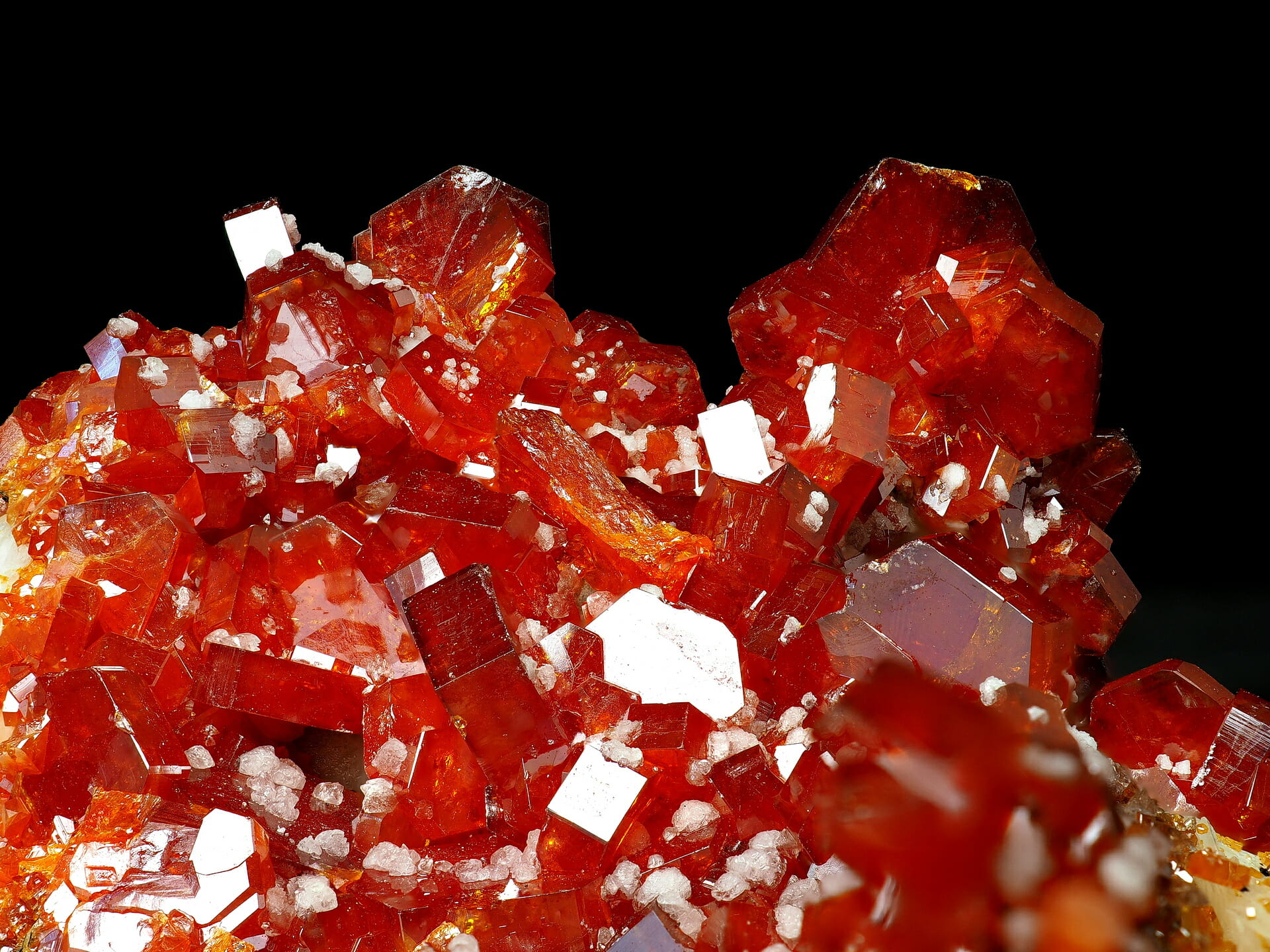 red vanadinite crystals with white baryte dots